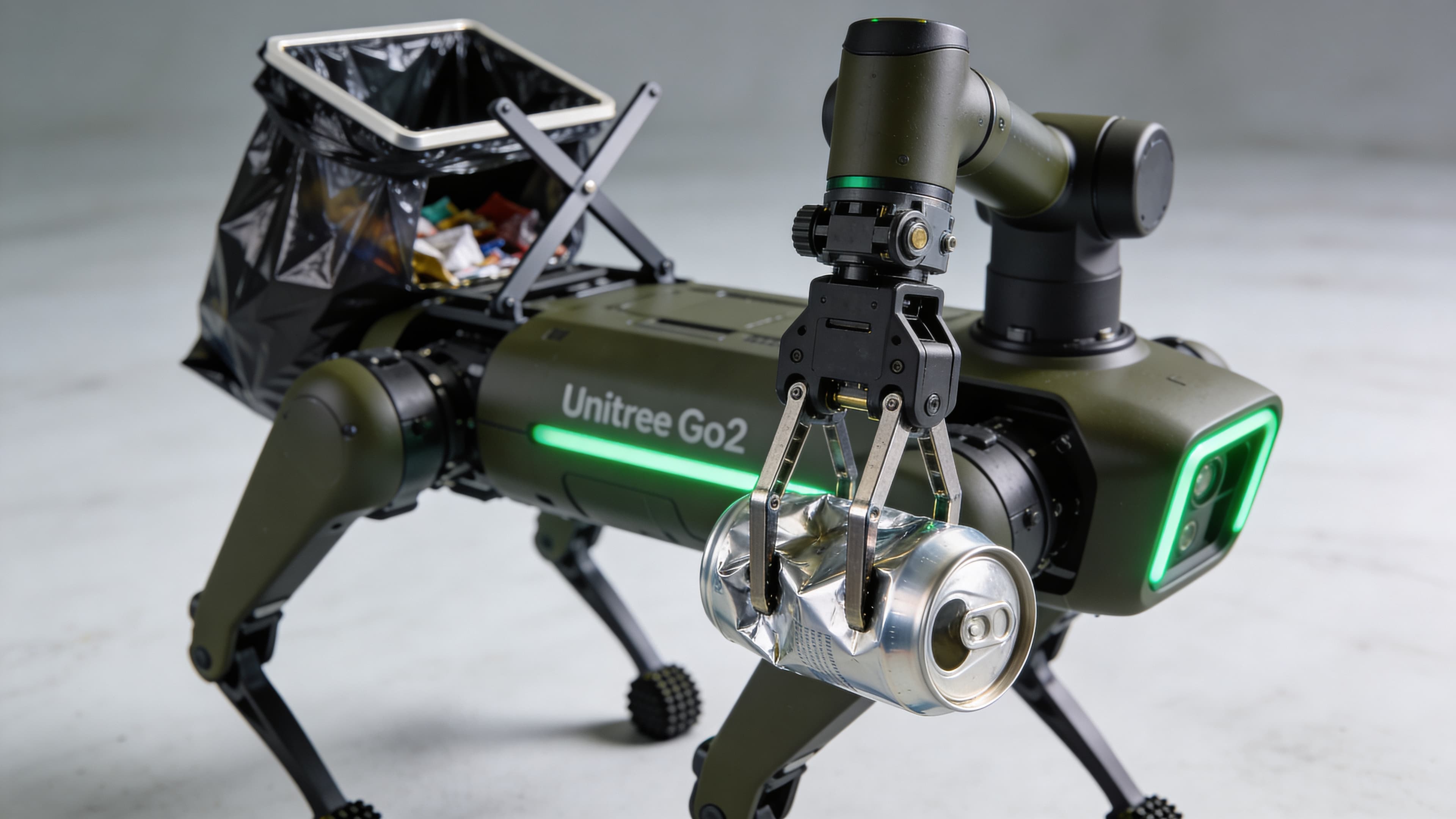 Close-up of CleanWalker's robotic gripper picking up an aluminum can with soft silicone fingers